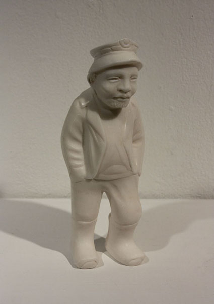 carving of old man out of marble by sculptor in china