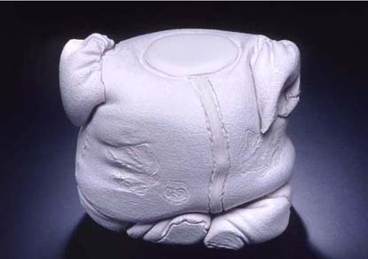 white plaster reconciled baby sculpture